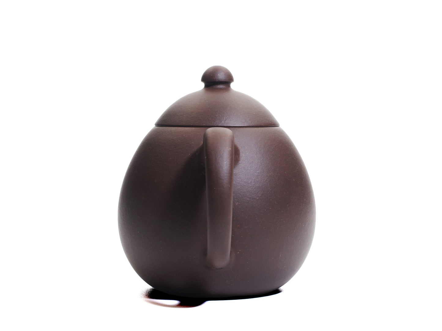 Rear view of the Da Long Dan teapot highlighting the rounded handle and balanced egg‑like silhouette.