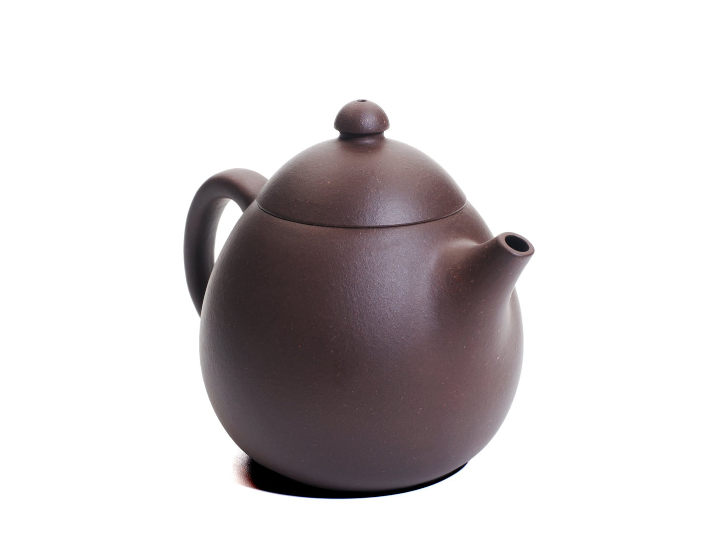 Angled front‑left view of the bronze grade Da Long Dan teapot with an egg‑shaped body, short curved spout and rounded handle.