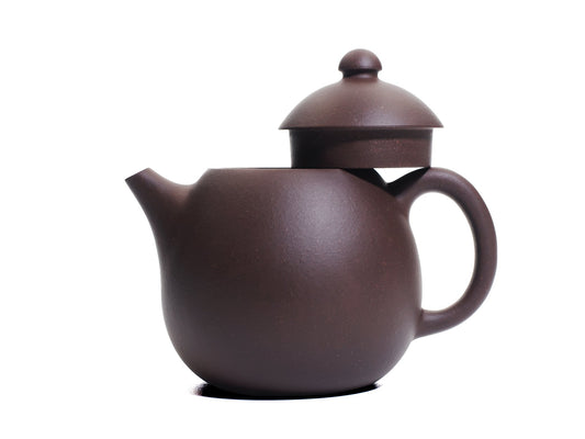Side view of the Da Long Dan teapot with its lid removed and resting on the handle, revealing the wide opening of the 290 ml egg‑shaped pot.