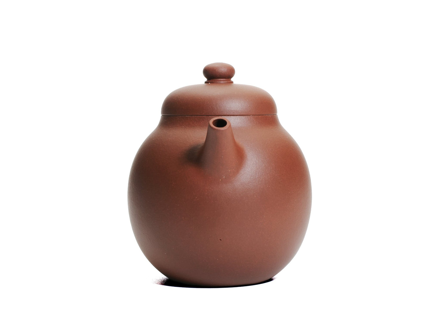 Front view of the Ming‑style Da Long Dan teapot showing the short spout emerging from the egg‑shaped body and the rounded lid knob.