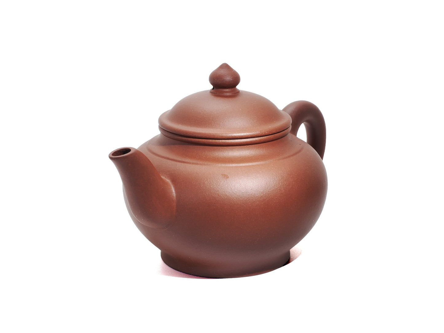 Angled front‑left view of the Hong Pi Long Xiao Ying Hu teapot showing its rounded belly, short spout and cherry‑shaped lid knob.