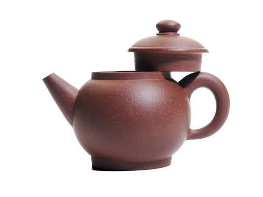 Ju Lun Zhu teapot with lid removed and resting on the handle, revealing the 120 ml mouth and round profile.