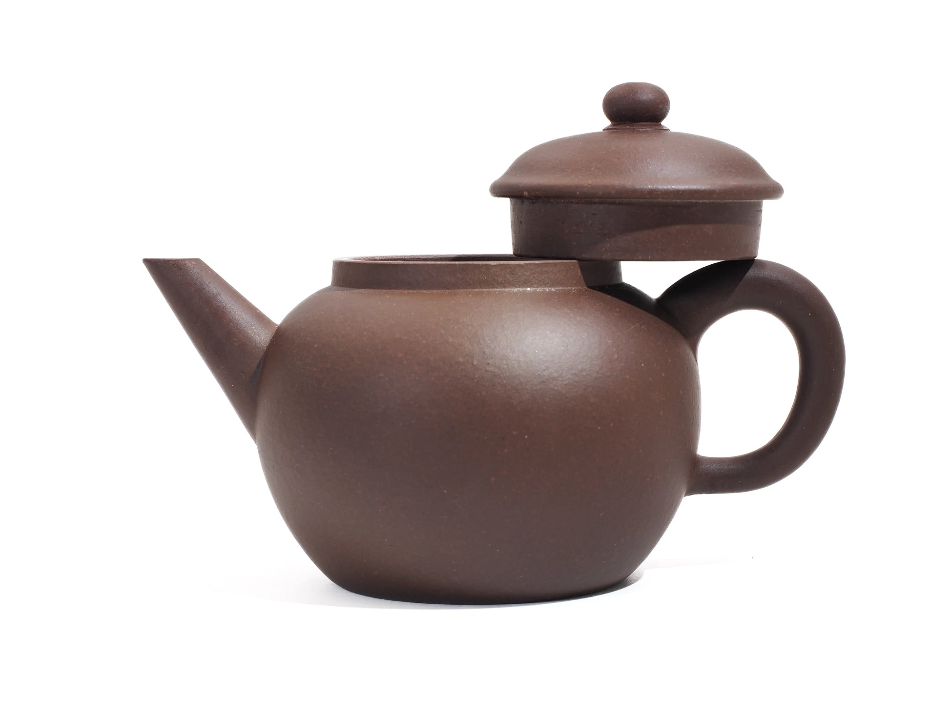 Bronze Grade teapot with lid propped open, displaying the solid construction and clay finish.