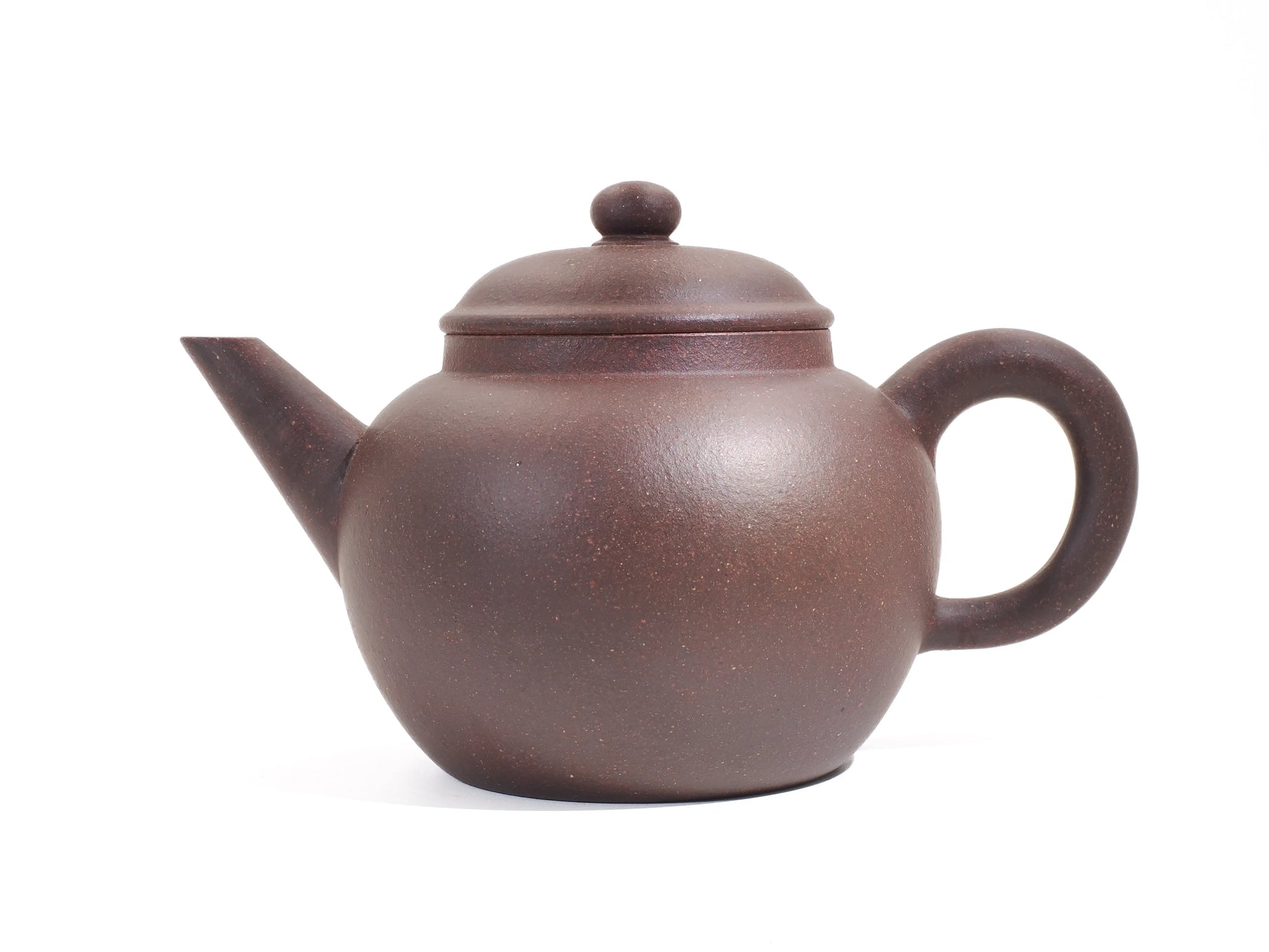 Side view of the Jade Grade Mo Yuan Zhai teapot, featuring a deep, warm dark clay body and classic 30th Anniversary shape.