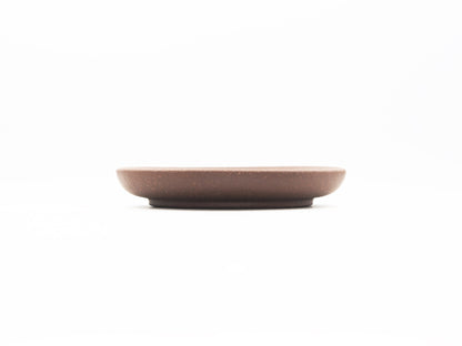 Side profile showing thickness and flat design of Dehou Yixing tea coaster